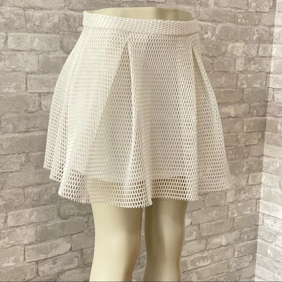 Charlotte Russe Dresses & Skirts - NWOT Charlotte Russe Perforated White Mini Skirt